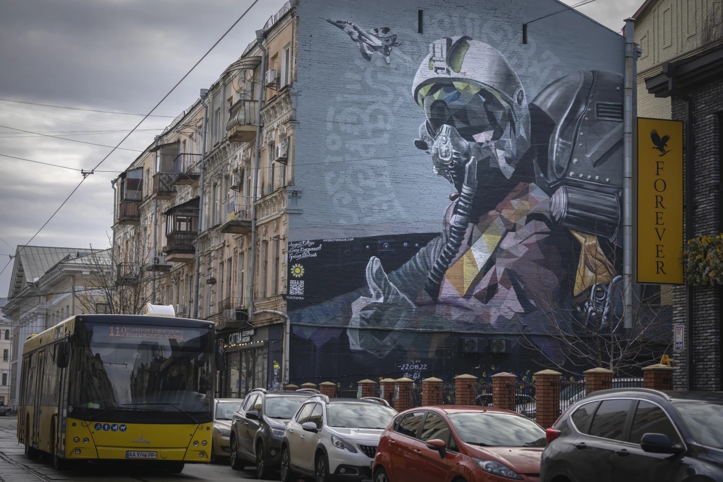 A mural depicts a Ukrainian pilot showing a thumbs-up sign on an apartment building wall in Kyiv, Ukraine, Friday, Jan. 19, 2024. The mural refers to a city legend of the Ghost of Kyiv, a flying ace who shot down six Russian pilots in the first 30 hours of the Russian invasion in February 2022 defending the sky over the capital. Photo: AP/Efrem Lukatsky A mural depicts a Ukrainian pilot showing a thumbs-up sign on an apartment building wall in Kyiv, Ukraine, Friday, Jan. 19, 2024. The mural refers to a city legend of the Ghost of Kyiv, a flying ace who shot down six Russian pilots in the first 30 hours of the Russian invasion in February 2022 defending the sky over the capital. Photo: AP/Efrem Lukatsky