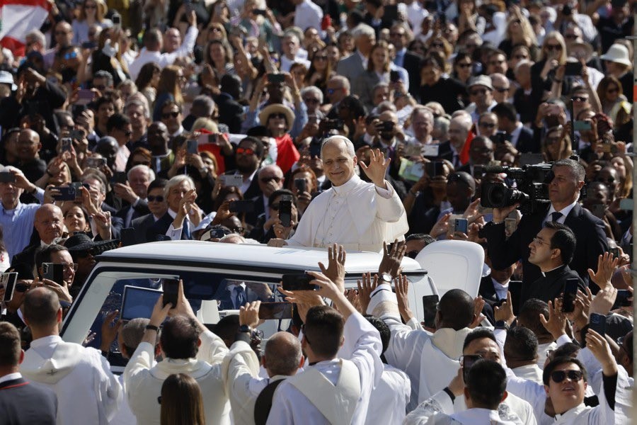 Pope Leo XIV riding the Popemobile in Rome, Dutch PM Dick Schoof's social media.