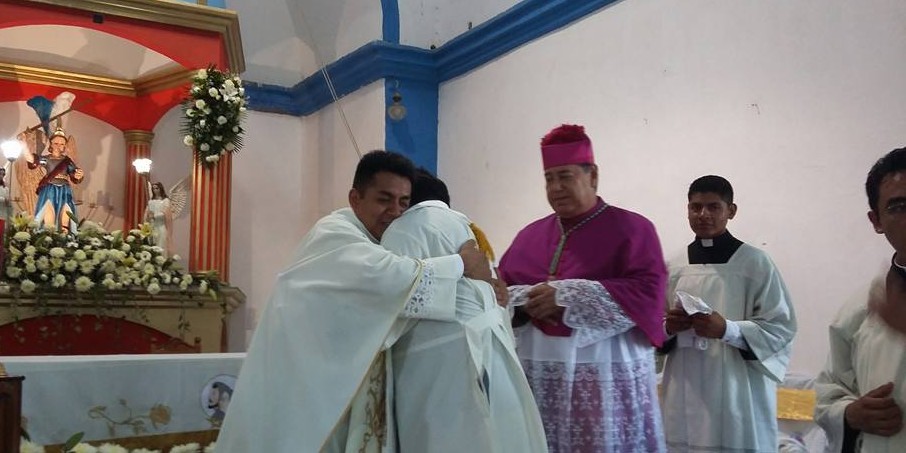 Bishop González Ramos (in so-called choir attire) watches as a priest from the Archdiocese of Acapulco congratulates Morseo Miramón Santiago after his first Mass in his hometown of San Miguel Xochistlahuaca in 2017. Photo from Miramón's social media. Bishop González Ramos (in so-called choir attire) watches as a priest from the Archdiocese of Acapulco congratulates Morseo Miramón Santiago after his first Mass in his hometown of San Miguel Xochistlahuaca in 2017. Photo from Miramón's social media.