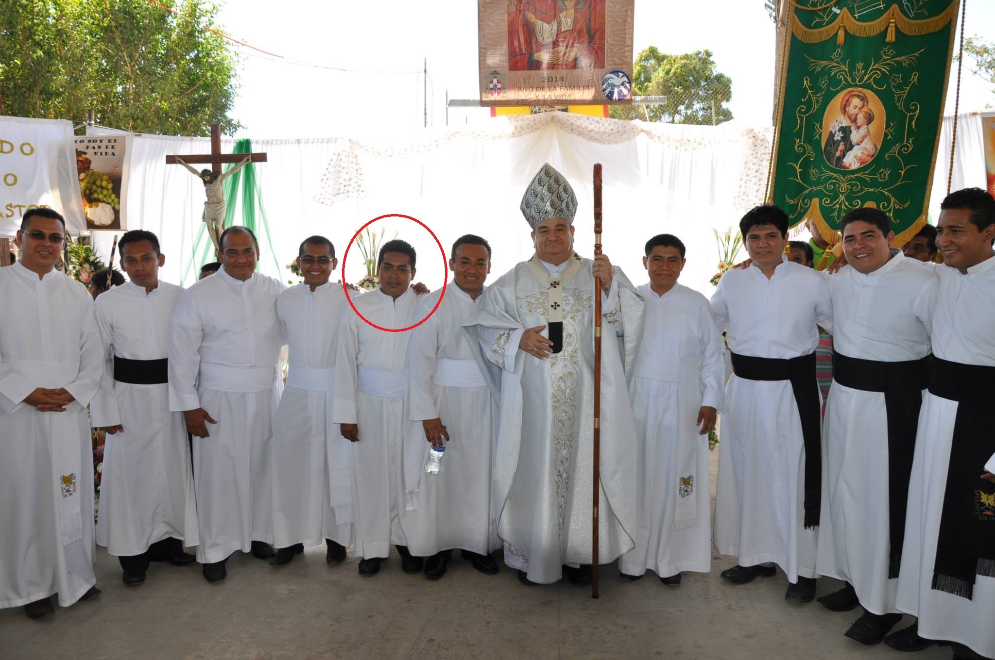Archbishop Carlos Garfias Merlos, then of Acapulco, holds a crosier at center, with then-seminarian Morseo Miramón Santiago circled in red, in 2014. Photo from the Archdiocese of Acapulco's social media. Archbishop Carlos Garfias Merlos, then of Acapulco, holds a crosier at center, with then-seminarian Morseo Miramón Santiago circled in red, in 2014. Photo from the Archdiocese of Acapulco's social media.