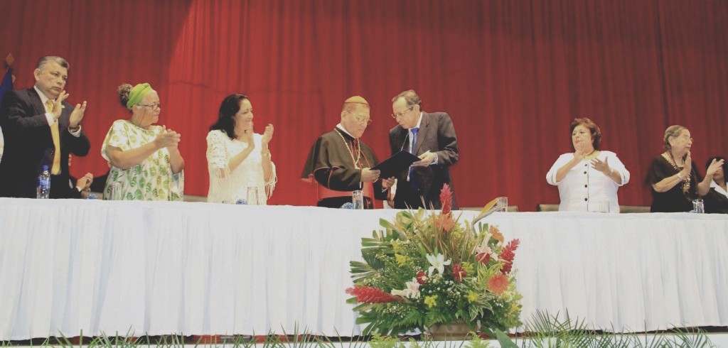 Cardinal Miguel Obando Bravo is distinguished as “National Hero of Peace and Reconciliation“ by the Nicaraguan National Assembly at an official ceremony. Full reference in the story. Cardinal Miguel Obando Bravo is distinguished as “National Hero of Peace and Reconciliation“ by the Nicaraguan National Assembly at an official ceremony. Full reference in the story.