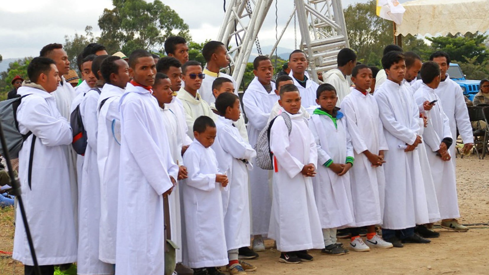 A group of seminarians and altar boys during and open air Mass in Antananarivo, Madagascar, July 9, 2023. Social media of the Catholic Church in Madagascar. 