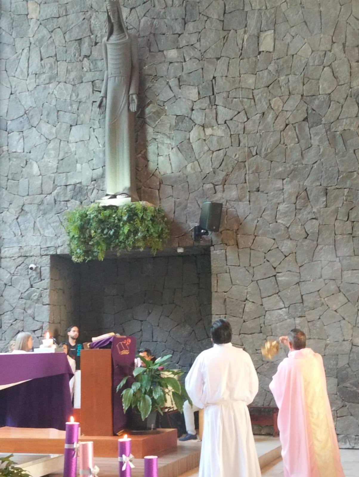 The large statue of Mary Queen presiding over the presbyterium is incensed during the Advent season 2025 by a priest. From their social media. The large statue of Mary Queen presiding over the presbyterium is incensed during the Advent season 2025 by a priest. From their social media.