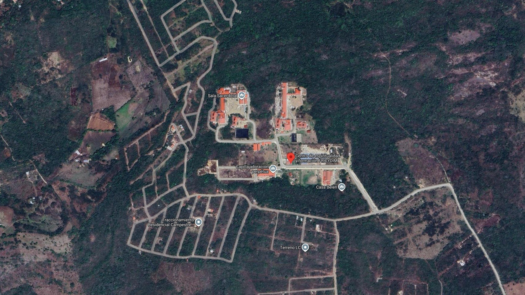 A screenshot from Google Maps' aerial view of the monastery compound in Berriozábal, Chiapas, identified as the FRICYDIM Center for Spirituality and Formation, available at www.maps.app.goo.gl/K4fRgDLCvRA3Gm7p9. 
