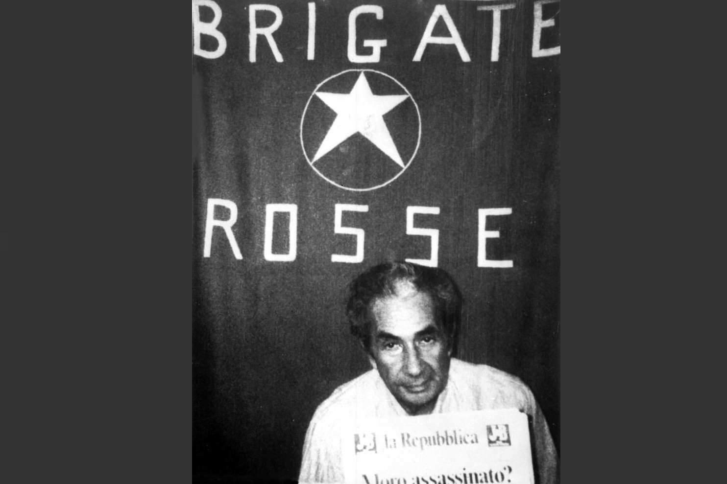 Aldo Moro holding a then recent edition of Italian newspaper La Repubblica asking “Was Moro killed?“ Undated, uncredited picture, distributed around April 1978, by the Red Brigades, the Italian terrorist organization behind Moro's kidnapping and assassination. Aldo Moro holding a then recent edition of Italian newspaper La Repubblica asking “Was Moro killed?“ Undated, uncredited picture, distributed around April 1978, by the Red Brigades, the Italian terrorist organization behind Moro's kidnapping and assassination.