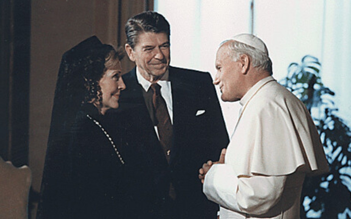 Pope John Paul II greets then U.S. President Ronald Reagan and his wife Nancy, Vatican, June 7, 1982. Uncredited picture NARA. Pope John Paul II greets then U.S. President Ronald Reagan and his wife Nancy, Vatican, June 7, 1982. Uncredited picture NARA.