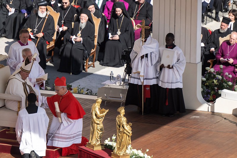 Late Pope Francis after elevating then Cardinal Robert Prevost at Saint Peter's Square, September 30, 2023. Picture by Marcin Mazur for the Catholic Church of England and Wales @ www.flickr.com/photos/catholicism/53229482386/in/photostream/. 