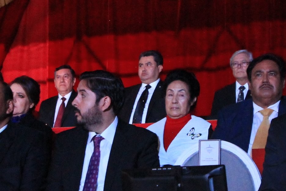 At the top row, wearing a black necktie Naasón Joaquín García during the 2018 celebration of his leadership at the Luz del Mundo Church. To his left on the same row, then-governor of Baja California, Jaime Bonilla. On the next row, sporting a white jacket, Eva García de Joaquín, Naasón's mother. In the first row, wearing a purple necktie, Hamlet García Almaguer, a now former federal MP in Mexico. December 14, 2018. Picture in the Movimiento Ciudadano Jalisco official feed at www.flickr.com/photos/dipciudadanos/32459361988/in/photostream/. At the top row, wearing a black necktie Naasón Joaquín García during the 2018 celebration of his leadership at the Luz del Mundo Church. To his left on the same row, then-governor of Baja California, Jaime Bonilla. On the next row, sporting a white jacket, Eva García de Joaquín, Naasón's mother. In the first row, wearing a purple necktie, Hamlet García Almaguer, a now former federal MP in Mexico. December 14, 2018. Picture in the Movimiento Ciudadano Jalisco official feed at www.flickr.com/photos/dipciudadanos/32459361988/in/photostream/.
