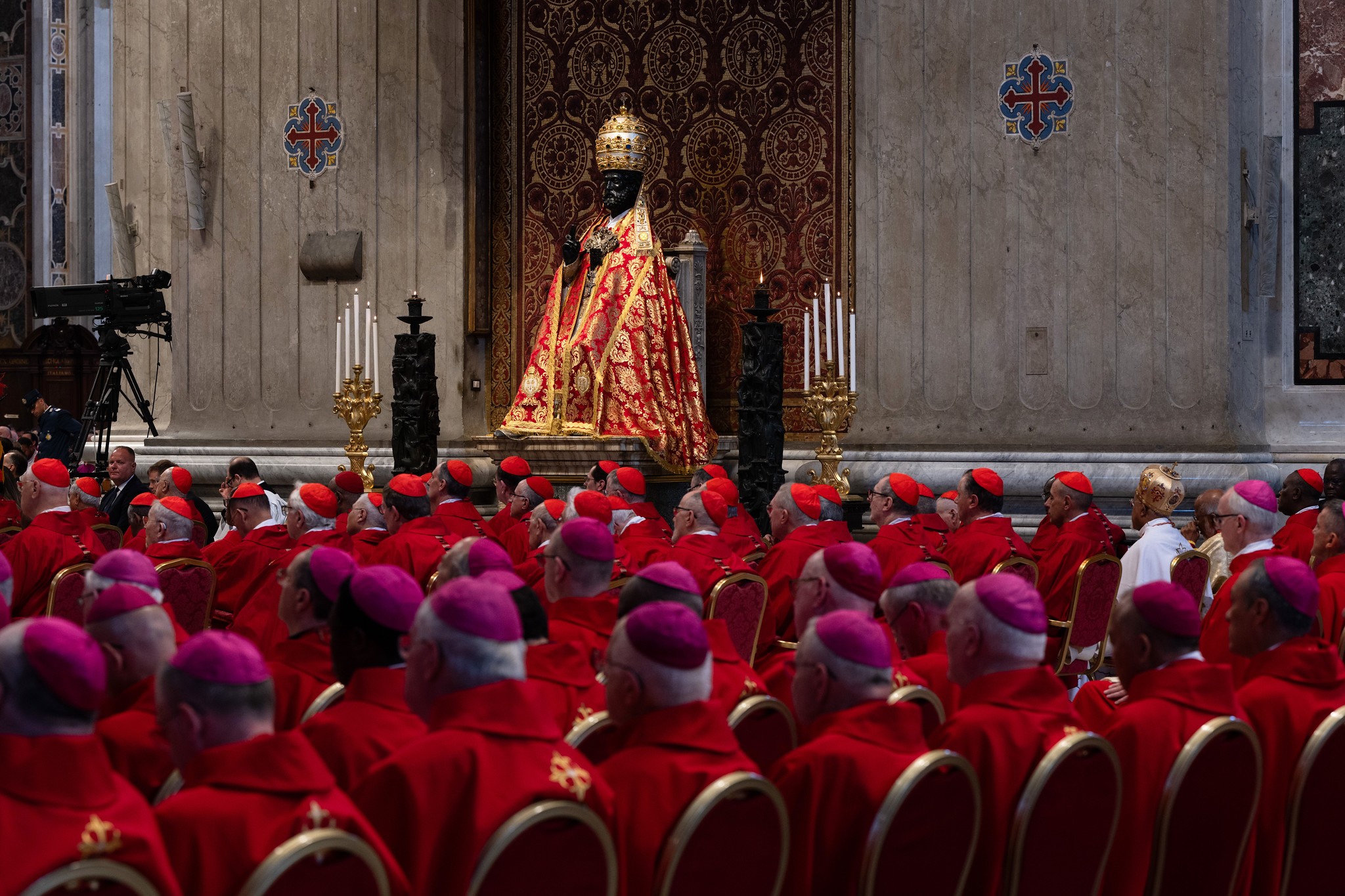 Bishops and cardinals seated near the statue of the Apostle in the Vatican Basilica during the Mass for the Solemnity of Saints Peter and Paul, June 29, 2026. Photo: Marcin Mazur for the Catholic Church of England and Wales @ www.flickr.com/photos/catholicism/55368824857/in/datetaken/ 
