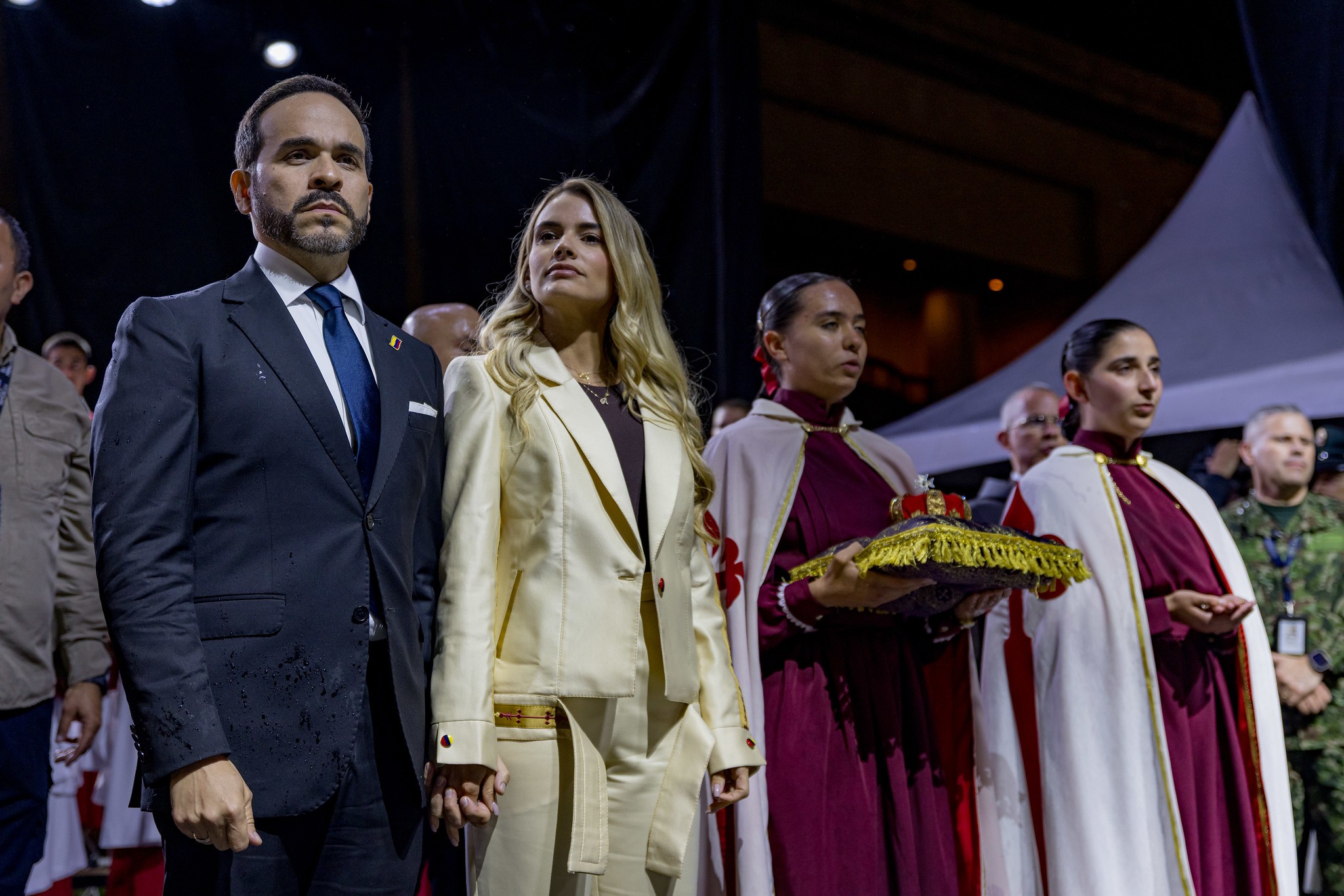 De la Espriella and his wife Ana Lucía Pineda Arauchán stand before the coronation of the sculpture of Our Lady of Fatima, while two female members of the Heralds of the Gospel show the crown to be used, August 28, 2026. Picture by the Presidency of Colombia @ www.flickr.com/photos/204852926@N07/55493524707/in/datetaken/ 